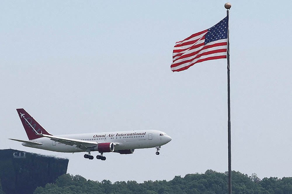 A plane carrying the first group of white South Africans granted refugee status for being deemed victims of racial discrimination under U.S. President Trump's Refugee plan, arrives at Dulles International Airport in Virginia May 12, 2025. (OSV News/Reuters/Jonathan Ernst)
