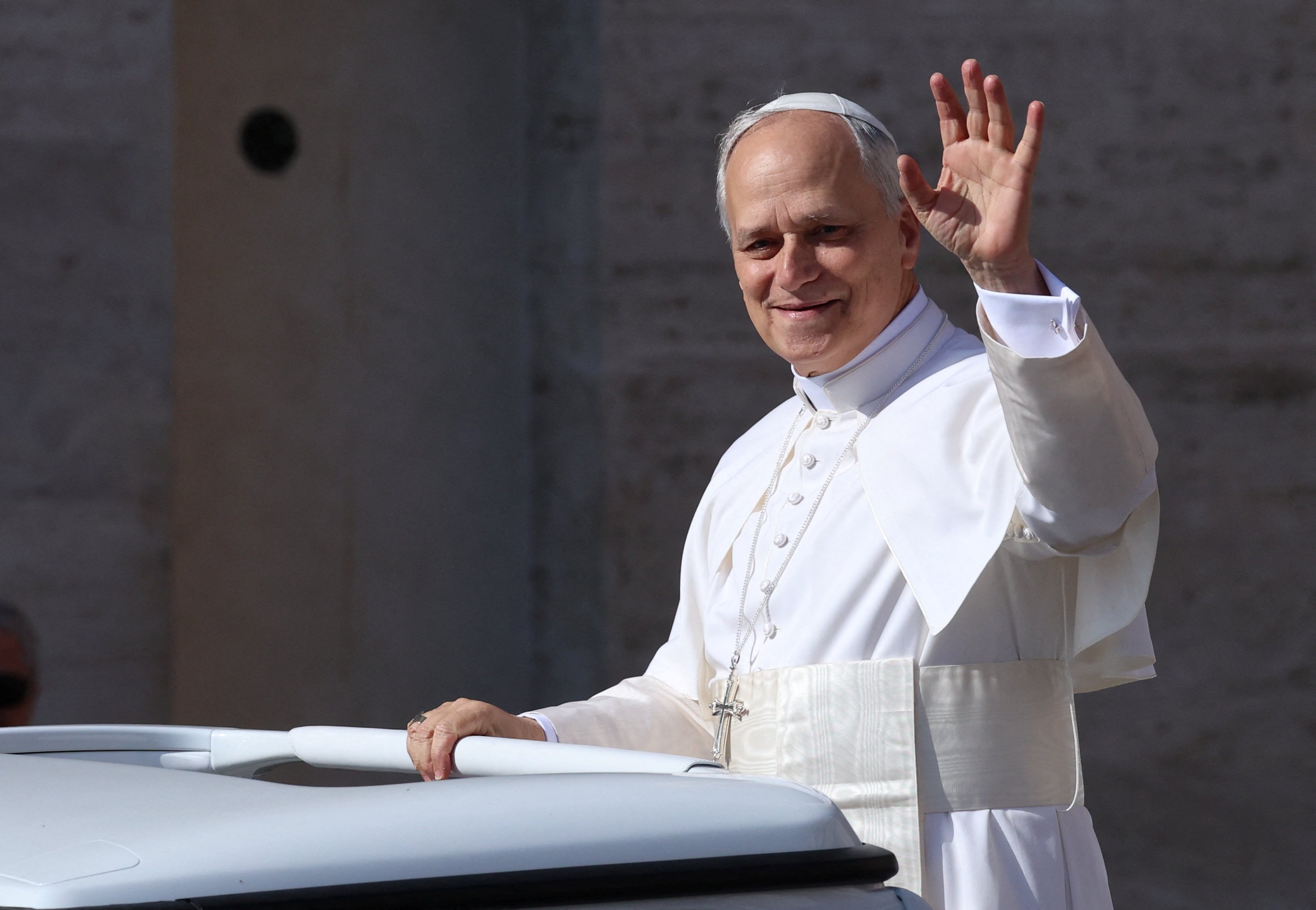 Pope Leo XIV, formerly Cardinal Robert Francis Prevost, waves as he arrives to celebrate his inauguration Mass at the Vatican May 18, 2025. He is the first U.S. pope in history. (OSV News/Reuters/Claudia Greco)