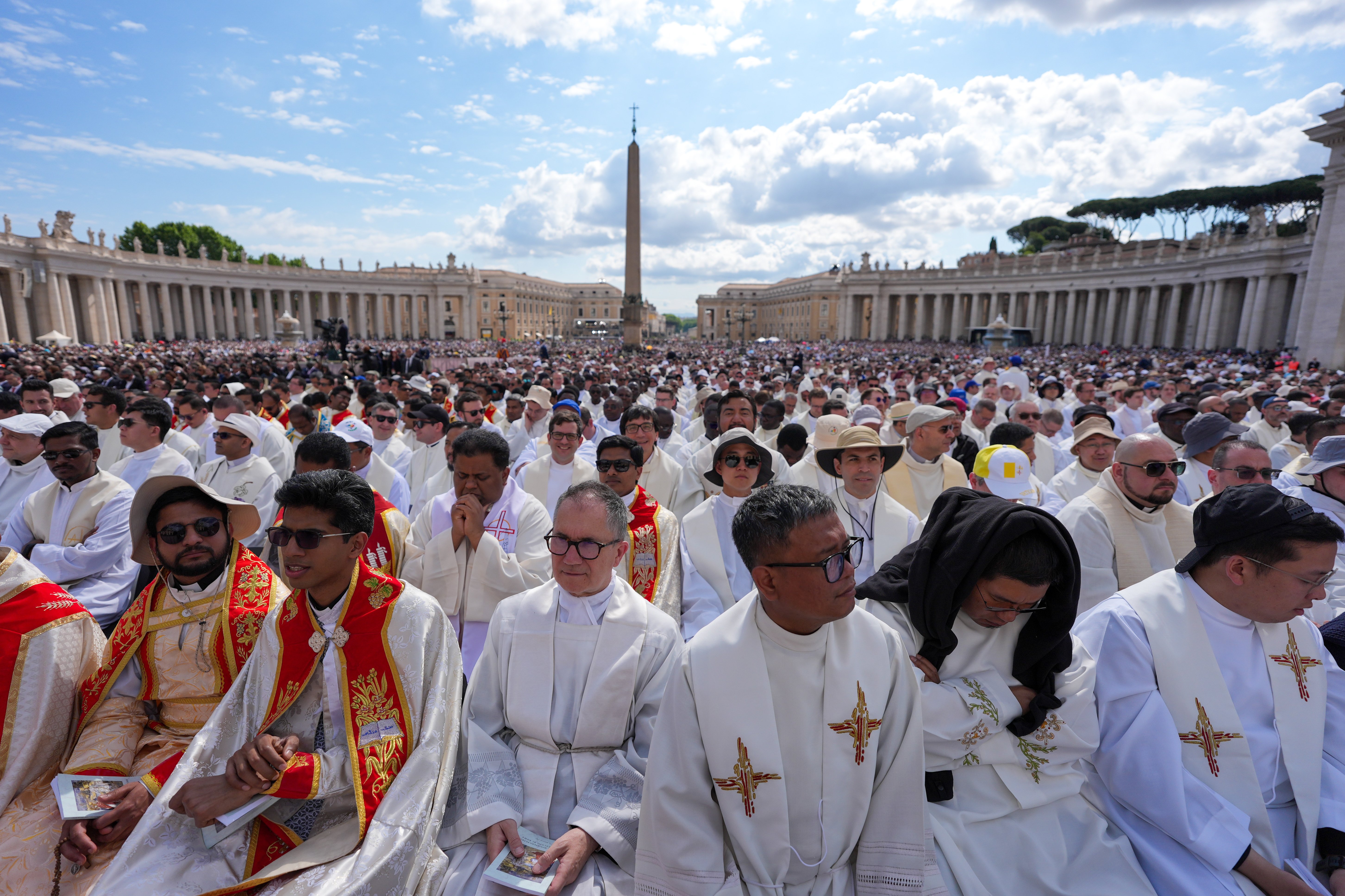 Priests gather in St. Peter's Square for Pope Leo XIV's installation Mass at the Vatican May 18, 2025. (CNS photo/Lola Gomez)