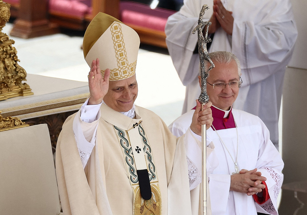 Pope Leo XIV, formerly Cardinal Robert Francis Prevost, waves at the conclusion of his inauguration Mass at the Vatican May 18, 2025. He is the first U.S. pope in history. (OSV News/Reuters/Guglielmo Mangiapane)