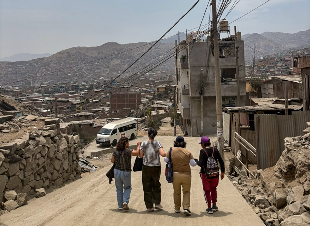 On the way back to the city from Lurigancho, Peru, the road was slippery and dry, but it was fun and safe when we held hands together firmly. Relying one another is such a wonderful practice of liberation theology among women. (Courtesy of Sophia Park)