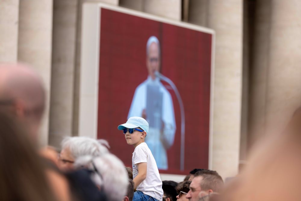 People gather in St. Peter's Square at the Vatican to pray the "Regina Caeli" prayer with Pope Leo XIV
