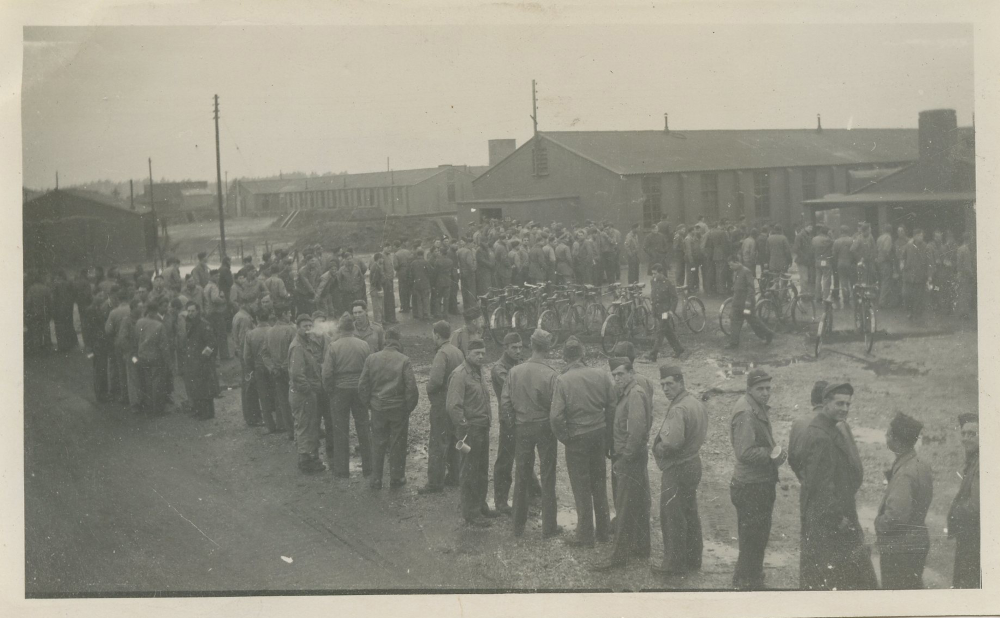 American soldiers stand in line waiting for food in December 1943 in England.