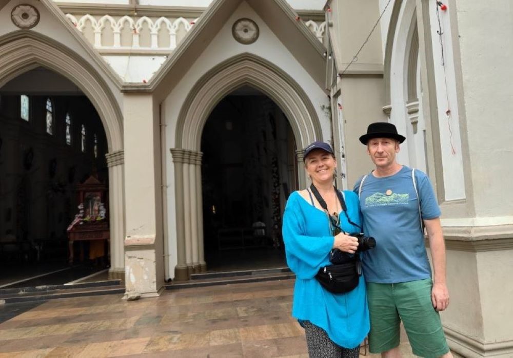 tourists outside church