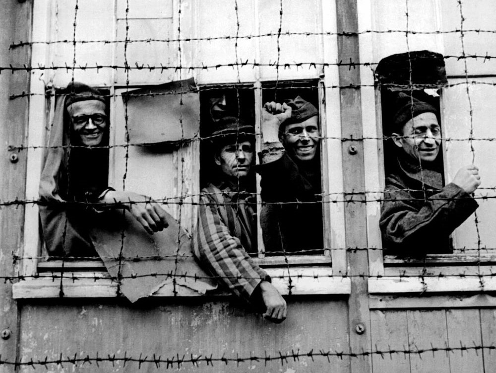 Prisoners are seen in the Nazi concentration camp of Dachau in 1945.