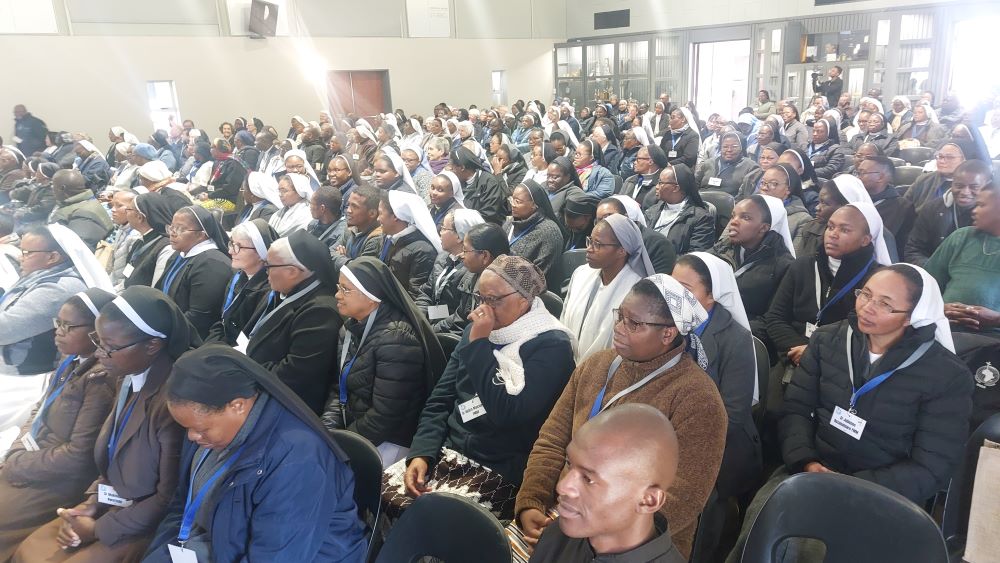 large group at symposium