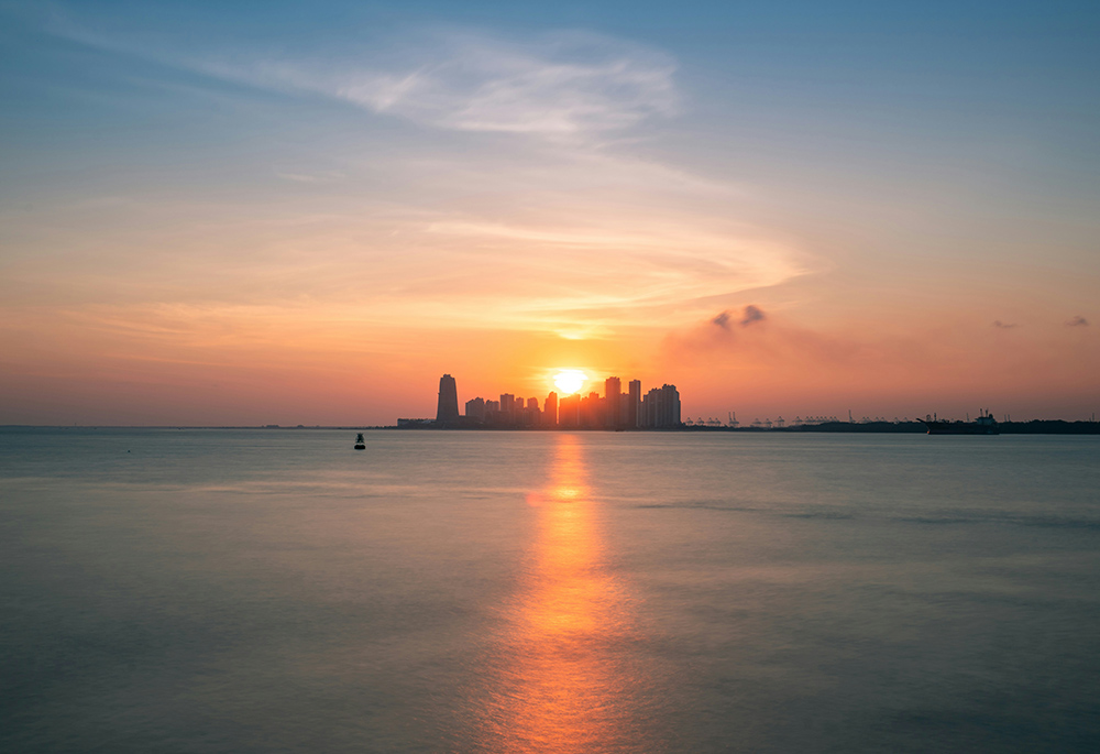 A shot from Raffles Marina in Singapore, looking toward Johor Bahru, Malaysia (Unsplash/Fuyu Yeo)