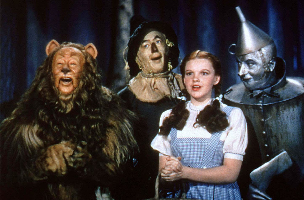 The cast of the 1939 movie ''The Wizard of Oz'' included (from left) Bert Lahr as the Cowardly Lion, Ray Bolger as Scarecrow, Judy Garland as Dorothy and Jack Haley as the Tin Man. (CNS/Warner Bros.)