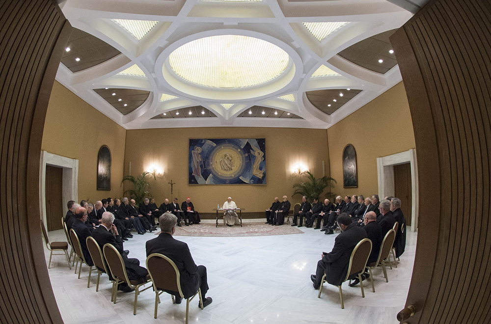 Pope Francis and 34 Chilean bishops are pictured meeting at the Vatican May 15, 2018, to discuss the clerical sexual abuse crisis in Chile. (CNS/Vatican Media)