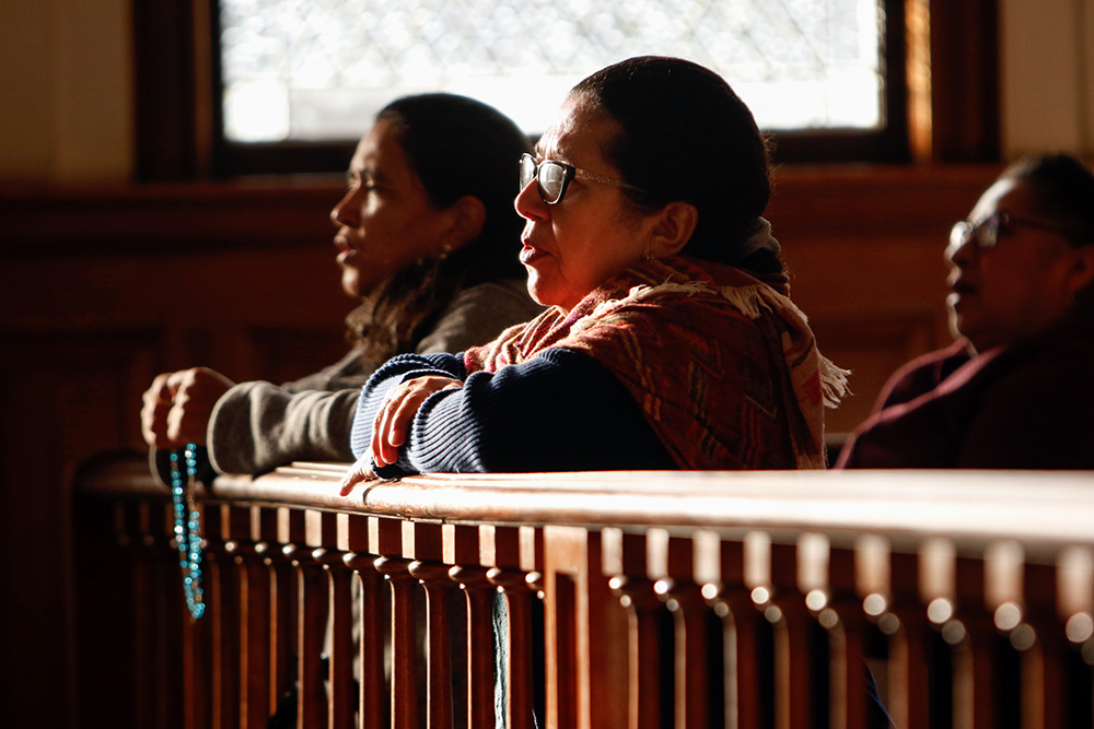 Women pray the rosary before Mass in 2018 at Our Lady of Loretto Church in Hempstead, N.Y. (CNS/Gregory A. Shemitz)