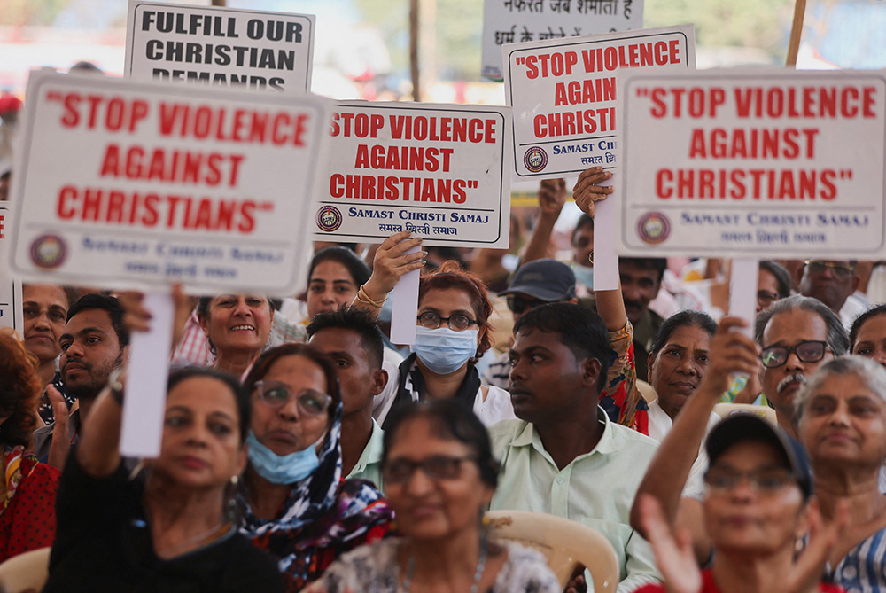 People hold placards during a protest in Mumbai, India, April 12, 2023, against what they claim are attacks on the Christian community, churches and institutions across India. (OSV News/Reuters/Francis Mascarenhas)