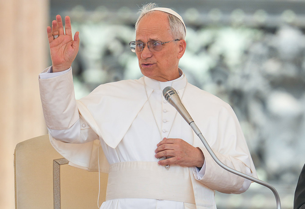 Pope Leo XIV gives his blessing at the conclusion of his weekly general audience in St. Peter's Square at the Vatican on June 4, 2025. (CNS/Lola Gomez)