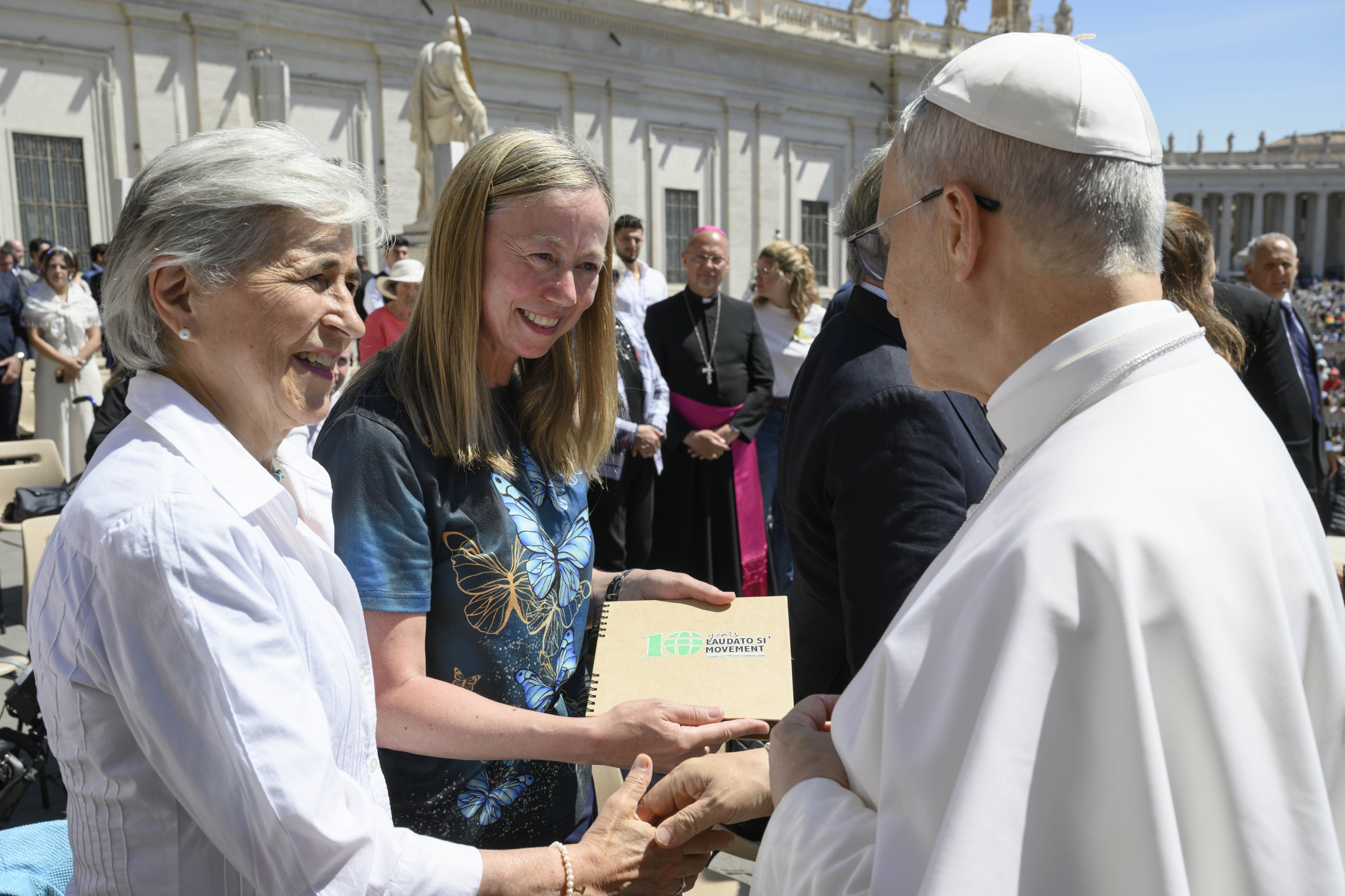 Pope Leo XIV greets María Lía Zervino, a member of the council of the Laudato Si' Movement, and Lorna Gold, executive director, after his weekly general audience in St. Peter's Square at The Vatican May 28, 2025. (OSV News photo/Simone Risoluti, Vatican Media/Catholic Press Photo)