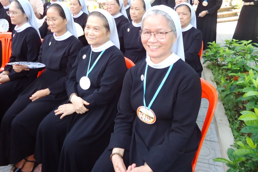 Sisters attend a ceremony in Hue in May 2024.