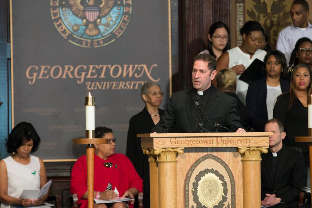 Jesuit Fr. Timothy Kesicki speaks at an April 18, 2017, "Liturgy of Remembrance, Contrition and Hope" at Georgetown University.
