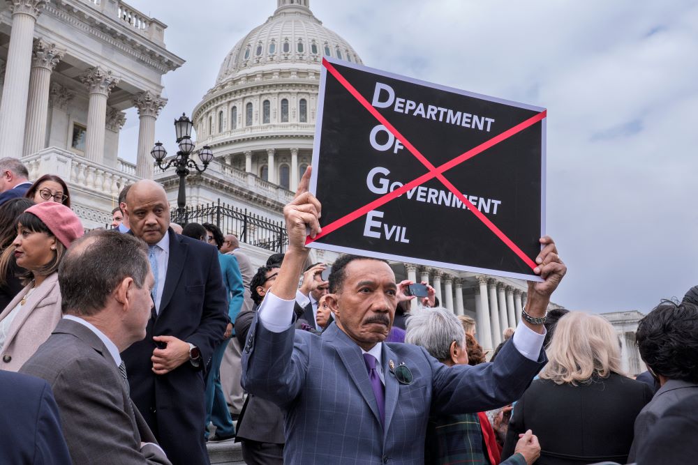 Rep. Kweisi Mfume, Democrat of Maryland, protests against DOGE, the Department of Government Efficiency, as he and other House Democrats speak out against the Republican budget plan, on the House steps at the Capitol in Washington, Feb. 25, 2025. (AP/J. Scott Applewhite)