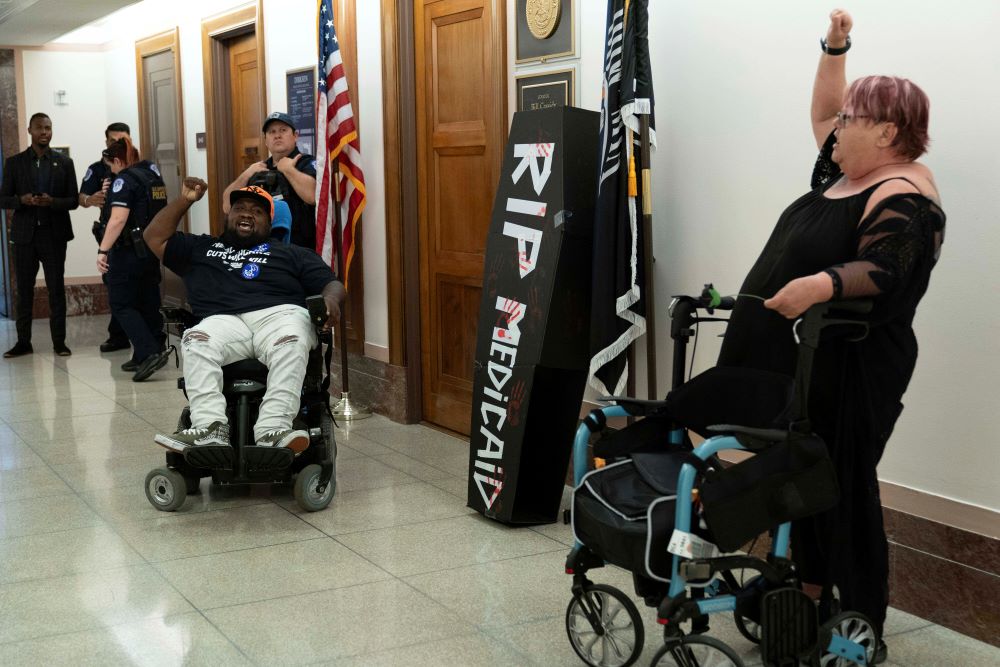 Demonstrators on wheelchairs protest outside the office of Sen. Bill Cassidy, Republican of Louisiana, regarding the proposed cuts to Medicaid, on Capitol Hill in Washington, June 11, 2025. (AP/Jose Luis Magana) Demonstrators on wheelchairs protest outside the office of Sen. Bill Cassidy, Republican of Louisiana, regarding the proposed cuts to Medicaid, on Capitol Hill in Washington, June 11, 2025. (AP/Jose Luis Magana)