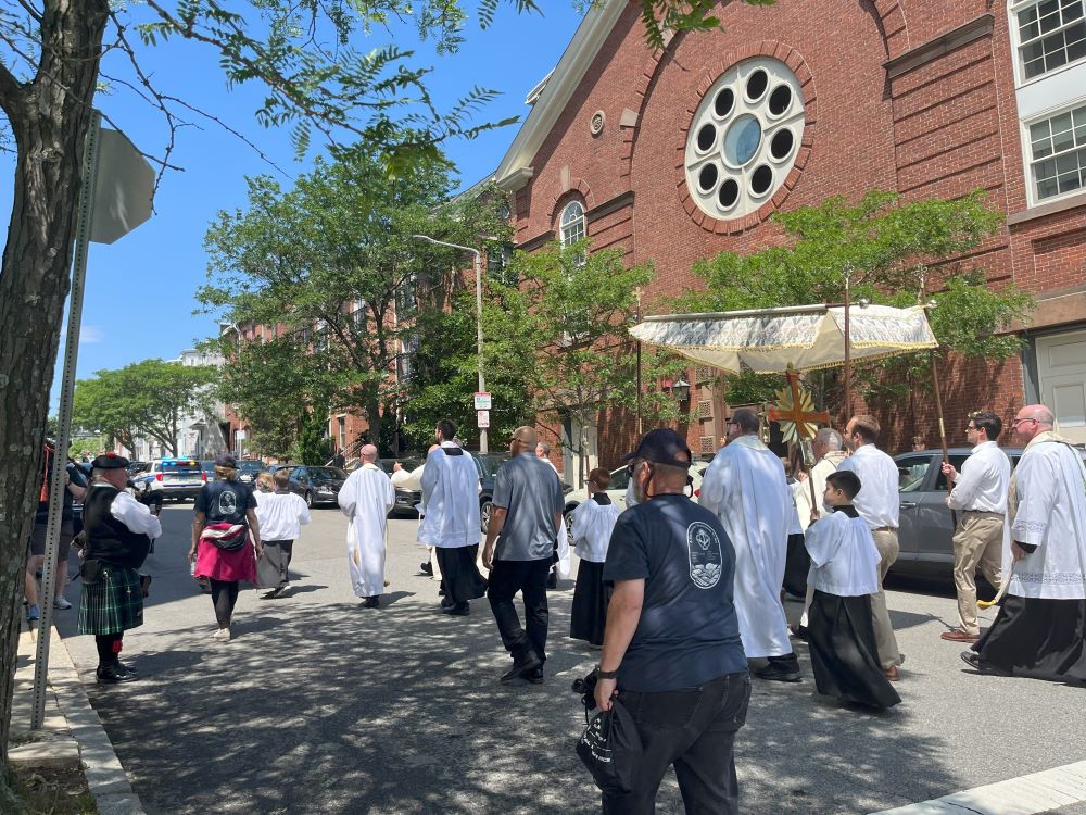 A bagpiper plays as the procession reached the Gate of Heaven Church in South Boston. A bagpiper plays as the procession reached the Gate of Heaven Church in South Boston.