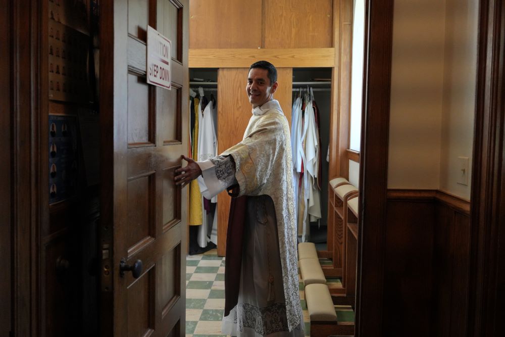 Alfredo Tuesta opens the door to the sacristy after a Mass at St. James Catholic Church, Falls Church, Va., on May 24. He was ordained as a priest June 7. (AP/Luis Andres Henao) Alfredo Tuesta opens the door to the sacristy after a Mass at St. James Catholic Church, Falls Church, Va., on May 24. He was ordained as a priest June 7. (AP/Luis Andres Henao)