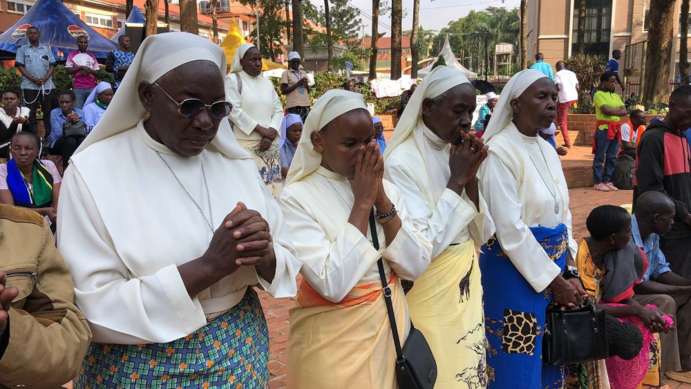 Catholic sisters pray at the  Uganda Martyrs Shrine at Namugongo in Kampala, Uganda's capital. The site honors 22 Catholics killed in the 19th century for refusing to denounce their faith. (GSR photo/Gerald Matembu)