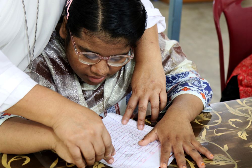 Sr. Nita Rozario with child