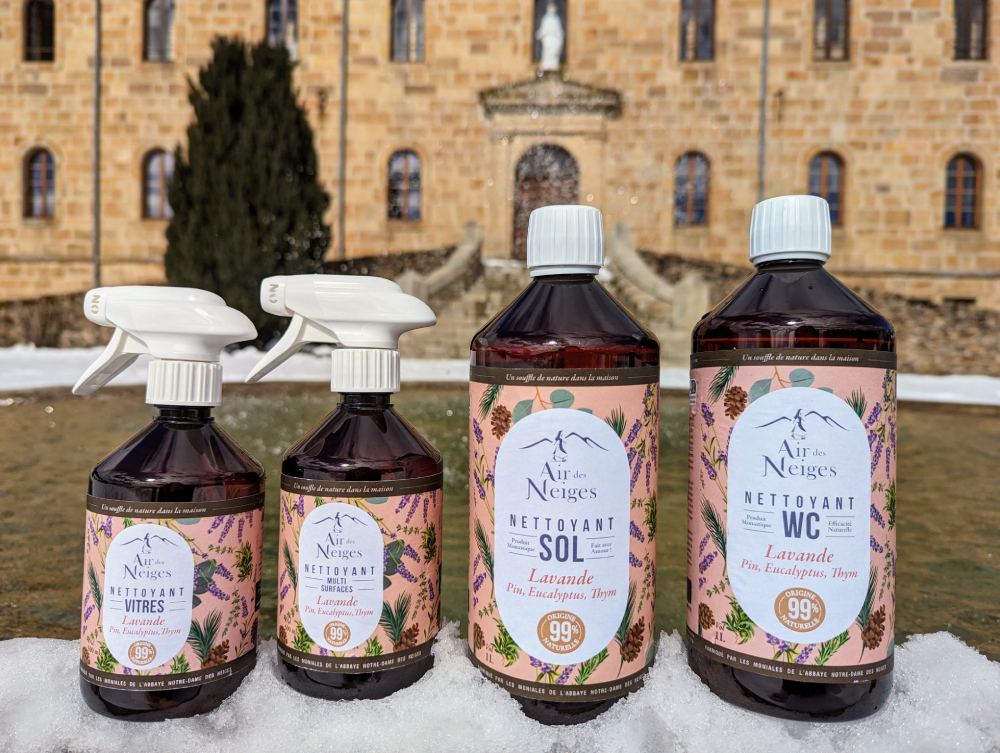 Air des Neiges, 99.9% natural cleaning products. In this photo are featured products in the scent of lavender with touches of pine, eucalyptus, and thyme. From left to right, a window cleaner, a multi-surface cleaner, a floor and a bathroom cleaner (Courtesy of Abbaye Notre-Dame des Neiges) 