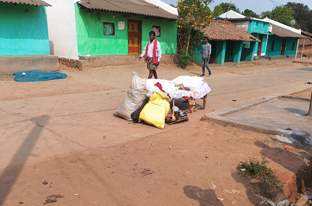 The body of Keshab Santa lies in the street after villagers denied him burial in Siunaguda, March 3, 2025. (Courtesy of Sujata Jena)