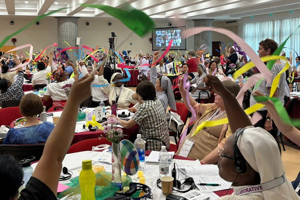 Attendees at the Hope 2025 gathering in Rome celebrate during one of the sessions. The event for sisters younger than 65 was held June 3-7 and intended to "explore our life, our future, and our gifts" as leaders and sisters, according to the event description. (Courtesy of Leadership Collaborative)