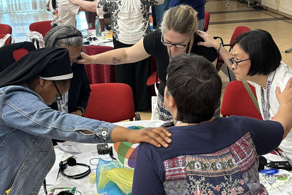 Attendees at the Hope 2025 gathering in Rome pray during one of the sessions. The event was held June 3-7 and focused on bringing younger sisters together from around the world. (Courtesy of Leadership Collaborative)