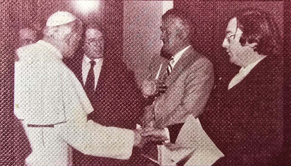 John Cooney meets Pope John Paul II. This photo is published on the back of Cooney's book, "Scotland and the Papacy," his assessment of Scottish Catholicism. (Sarah Mac Donald)