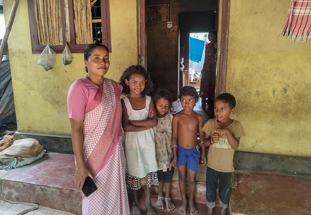 Charity Sr. Joicy Joy with children of Panthalam Unnati, an enclave in Kakkavayal, a village in the Wayanad district of Kerala, India. (George Kommattam)