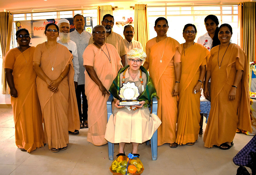 Franciscan Sisters of the Immaculate Sr. Maria Rosa poses with Franciscan nuns in Sumanahalli, Bengaluru, after receiving the "Sumanahalli Dr. Hansen's Award 2025" on Jan. 30, World Leprosy Day. (Courtesy of Fr. George Kannanthanam)