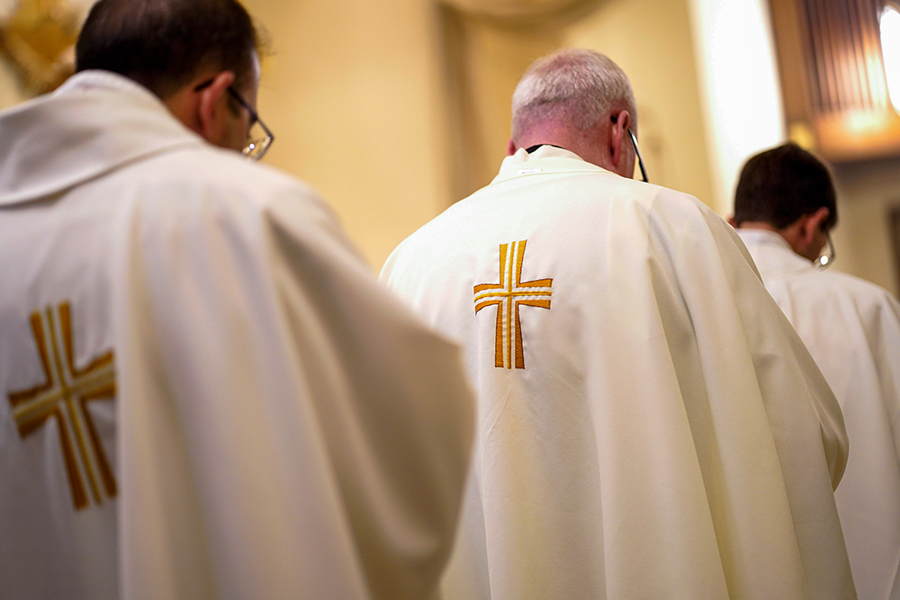 Priests are seen during a special Mass for vocations at Cure of Ars Church in Merrick, N.Y., Aug. 4, 2022, the feast of St. John Vianney, patron of parish priests. (CNS/Gregory A. Shemitz)