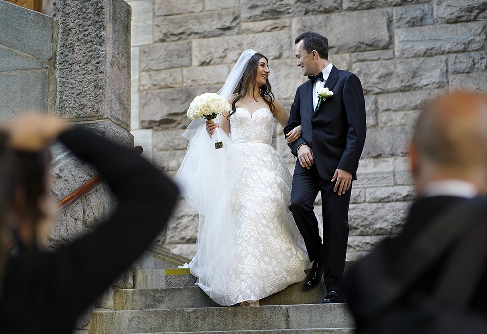 A bride and groom are seen leaving St. Paul the Apostle Church in New York City following their wedding in 2022. (OSV News/Gregory A. Shemitz)