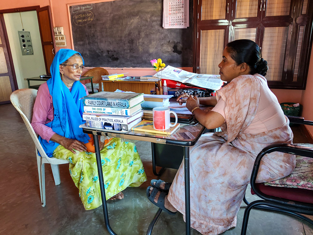 Charity Sr. Joicy Joy interacts with a Muslim woman in her office at Kakkavayal, a village in the Wayanad district of Kerala state in India. (Courtesy of Joicy Joy)