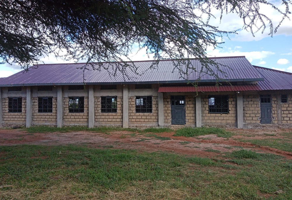 Sisters built the multipurpose hall in Savelberg Primary School with contributions from a charity walk. Their goal was to raise enough money to build new classrooms and a borehole. Although the sisters did not raise enough for new classrooms and a borehole, they built a multipurpose hall that is partitioned into classrooms and a dining hall. (Mourine Achieng)