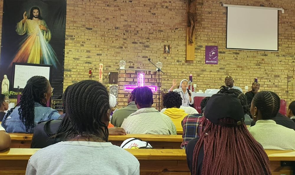 Sr. Thao Phi addresses the audience during a Lenten retreat for youth and young adults.