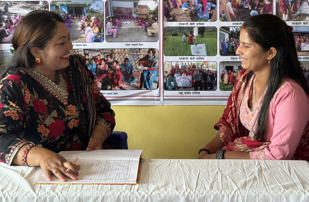 Jarmaya Thapa, left, a human rights officer with Navjyoti Centre in Surkhet, Nepal, sits with Jamuna Rokaya, a domestic violence survivor rebuilding her life. (Pragati Shahi)
