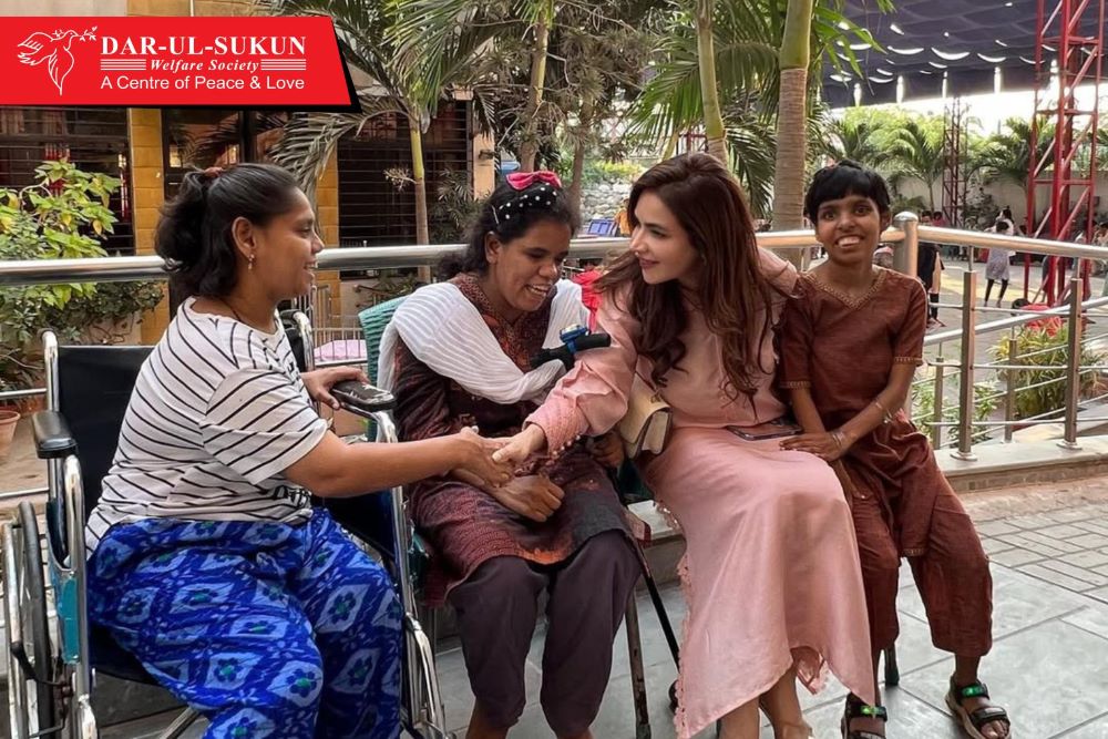 Humaira Asghar interacts with children at Dar-ul-Sukun, Karachi, Pakistan.