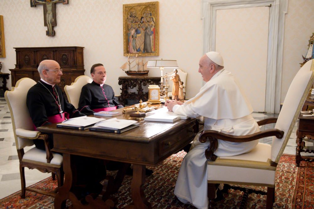 Pope Francis meets Msgr. Fernando Ocáriz and Msgr. Mariano Fazio in 2021.