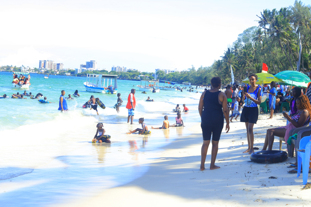 People enjoy the sun and surf at Pirates Beach in Mombasa. (GSR photo/Doreen Ajiambo)