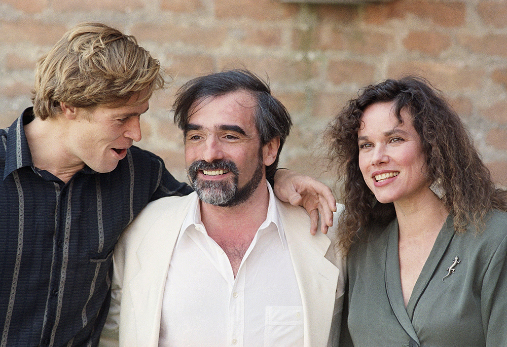 In this file photo dated Sept. 7, 1988, director Martin Scorsese, center, poses with the stars of his film, "The Last Temptation of Christ", actors Barbara Hershey, right, who plays Mary Magdalene, and William Dafoe who plays Christ, at the Venice Film Festival. The film released in 1988 in the face of denunciations from religious leaders. (AP photo, File)