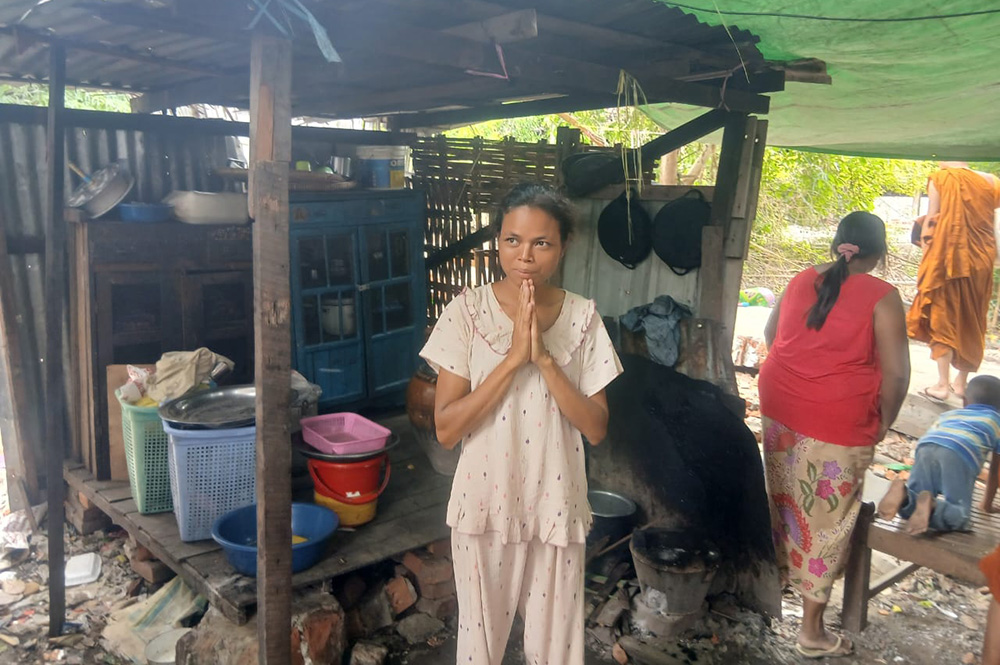 A Myanmar woman who lost her house in the earthquake thanks Catholic nuns for their consolation and support. (Courtesy of Melanie Mai Chit Yin)