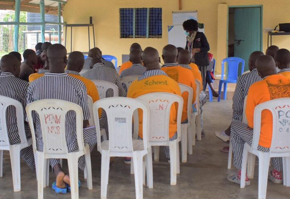 Inmates at Nairobi West Prison, listen to a presentation by legal advocates during Legal Awareness Week on Oct. 30, 2024. The annual initiative, organized by the Law Society of Kenya, promotes access to justice, legal education, and seeks to address prison congestion across the country. (Courtesy of Hedwig Muse)