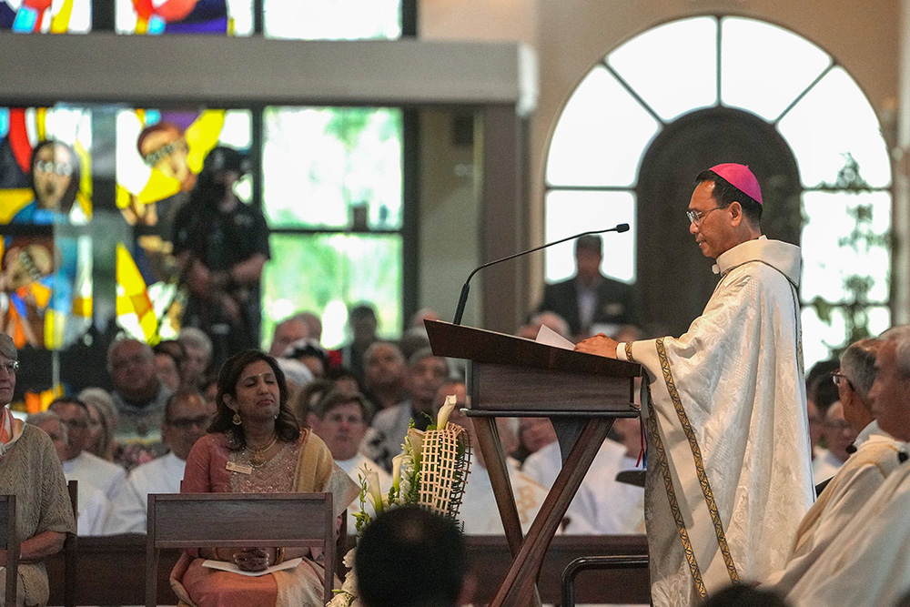 Bishop Michael Pham gives his homily at his installation Mass on July 17, 2025, at St. Thérèse of Carmel Parish in San Diego. (NCR photo/Chris Stone)