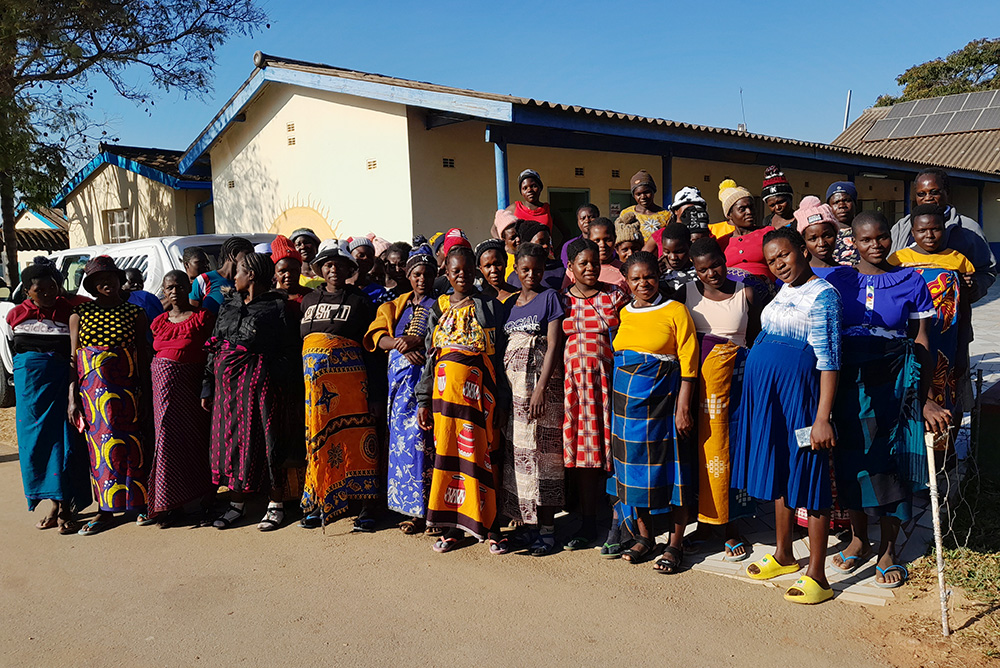 Women who benefit from the nutritional program gather at St. Albert's Mission Hospital in Muzarabani District, Zimbabwe. (Courtesy of Melania Nyamukuwa)