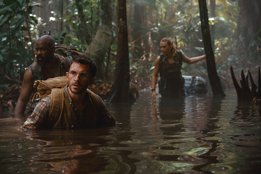 "Jurassic World Rebirth" takes the franchise back to its roots, with characters once again trapped on an island, contending with dinosaurs and trying to escape. (Universal Pictures)
