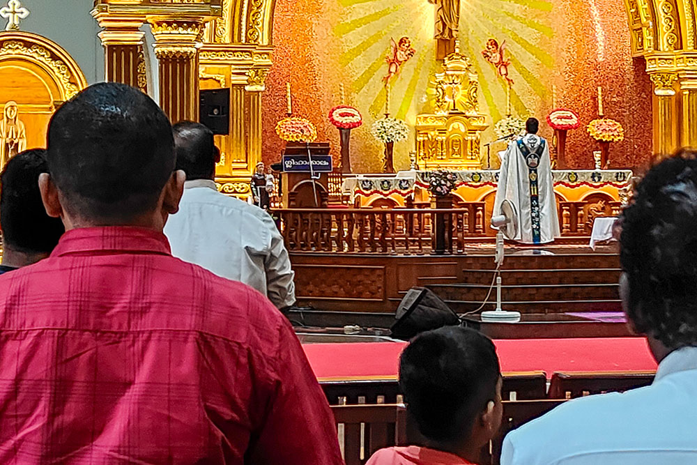 A priest celebrates Mass facing the altar in St. Mary's Church, Alangad, one of the oldest churches of the Ernakulam-Angamaly Archdiocese in the southwestern Indian state of Kerala. (Thomas Scaria)