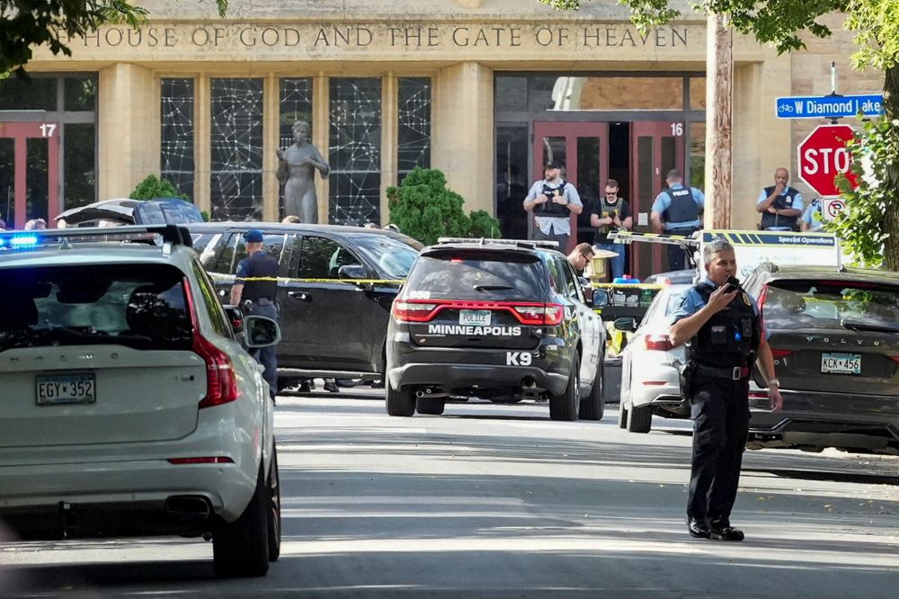First responders block the crime scene following a shooting at Annunciation Catholic School in Minneapolis Aug. 27.