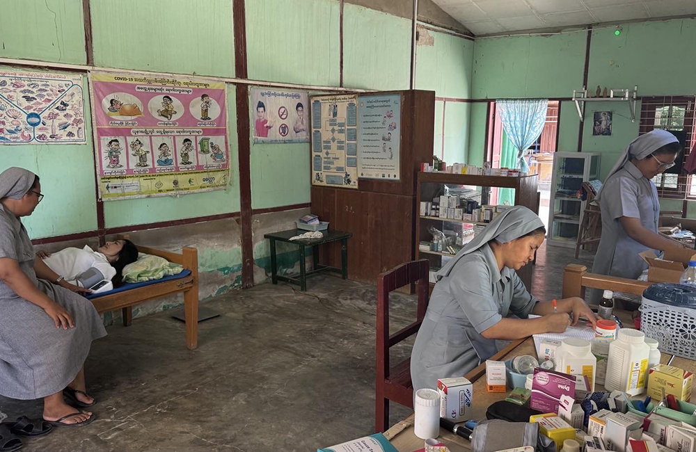 Three St. Joseph sisters (Sr. Roselyn Kay Mg is pictured at left) administer health care in a small clinic which helps orphans and villagers in Zaw Gyi village, Archdiocese of Mandalay. (John Zaw)